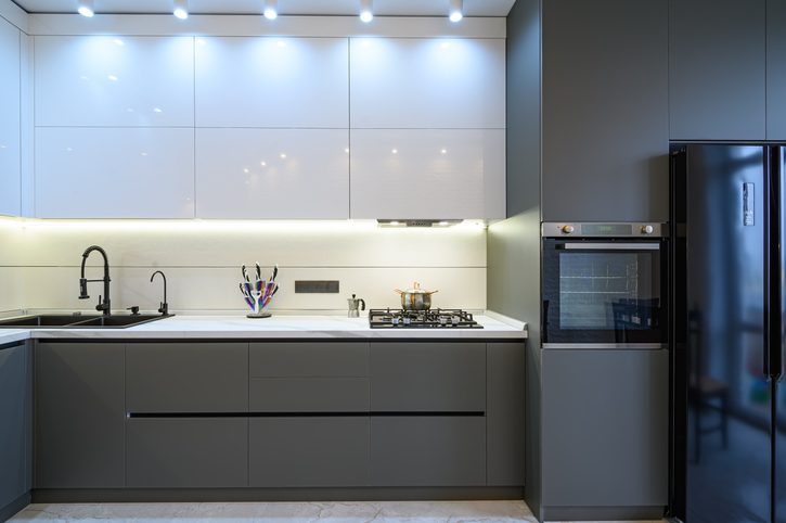 Luxury grey modern kitchen interior. front view