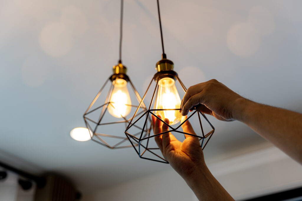 Person changing flickering or dimming lights