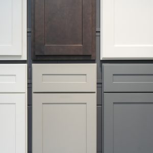 wood cabinet door samples displayed on the wall